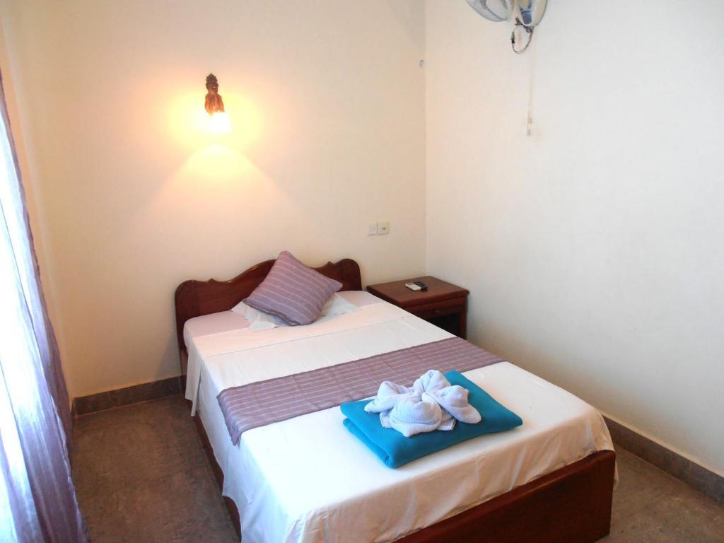 Firefly Guesthouse - The Berlin Angkor Siem Reap Værelse billede